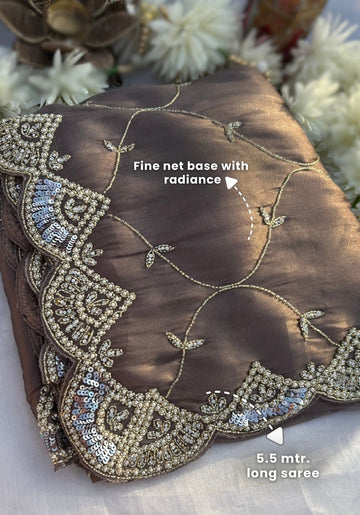 VEYONA- Fine net base with radiance designer saree with jaal work