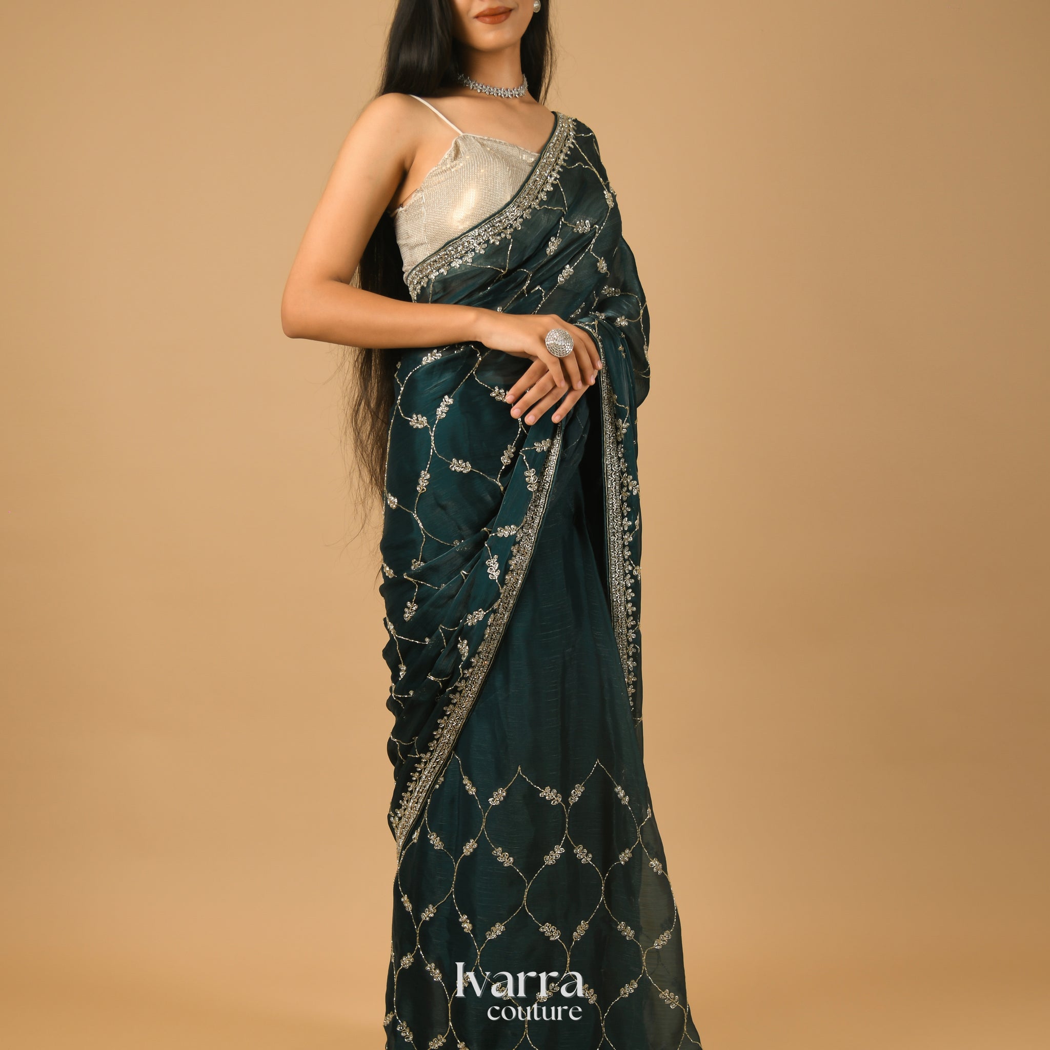 NAYANTHARA - Bottle green embellished saree in textured organza